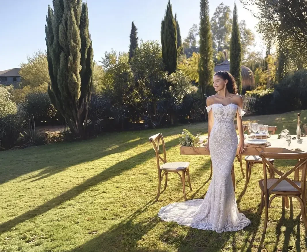 Model wearing a white wedding dress