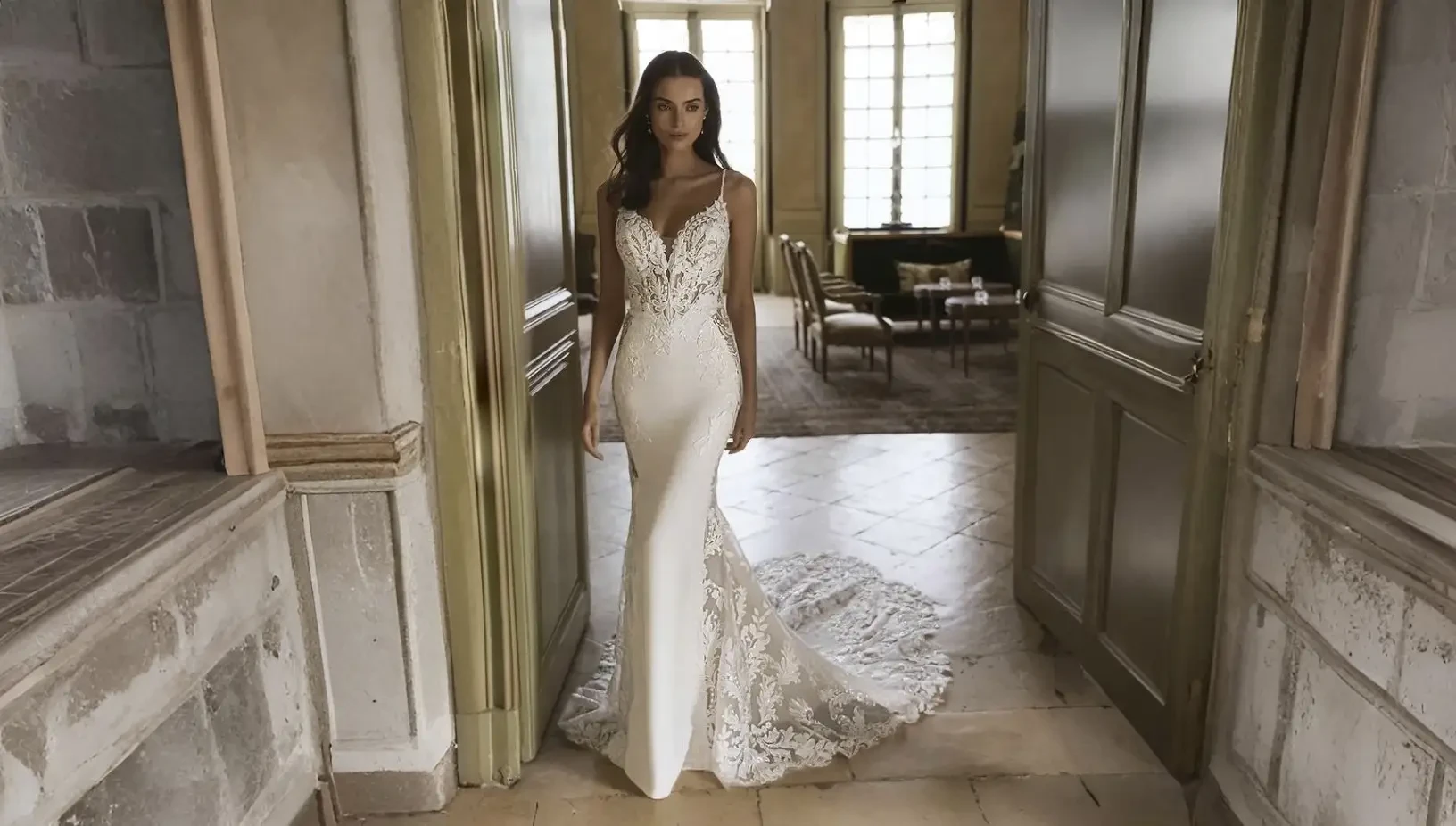Model wearing a white wedding dress