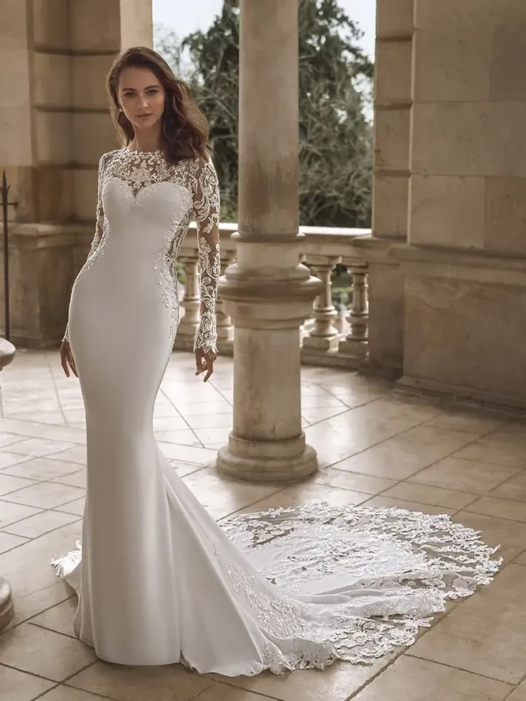 Model wearing a white wedding dress