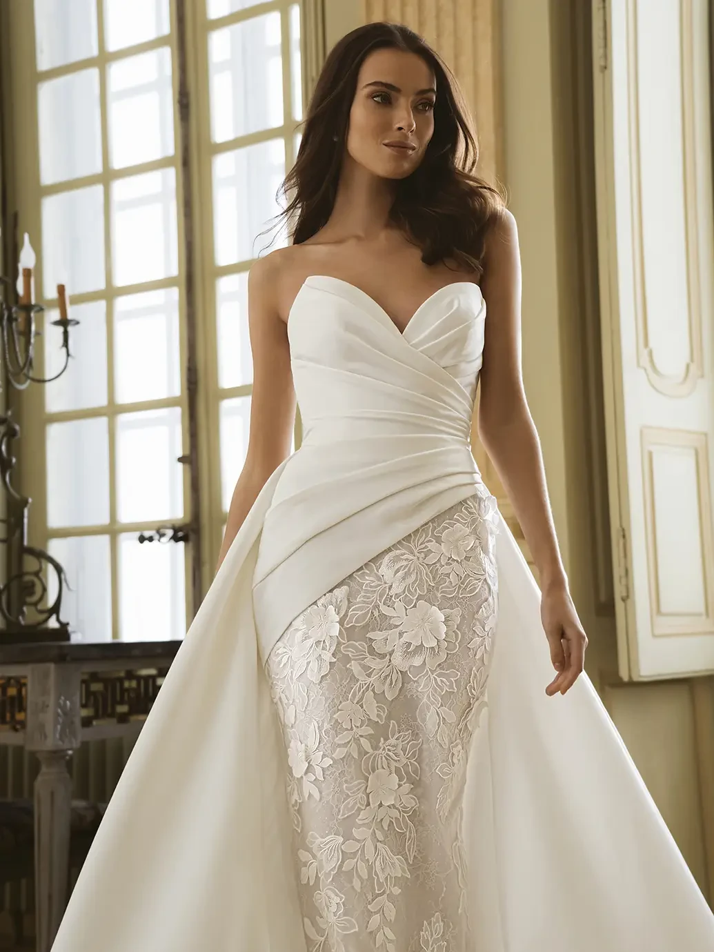Model wearing a white wedding dress