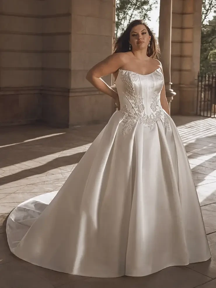 Model wearing a white wedding dress