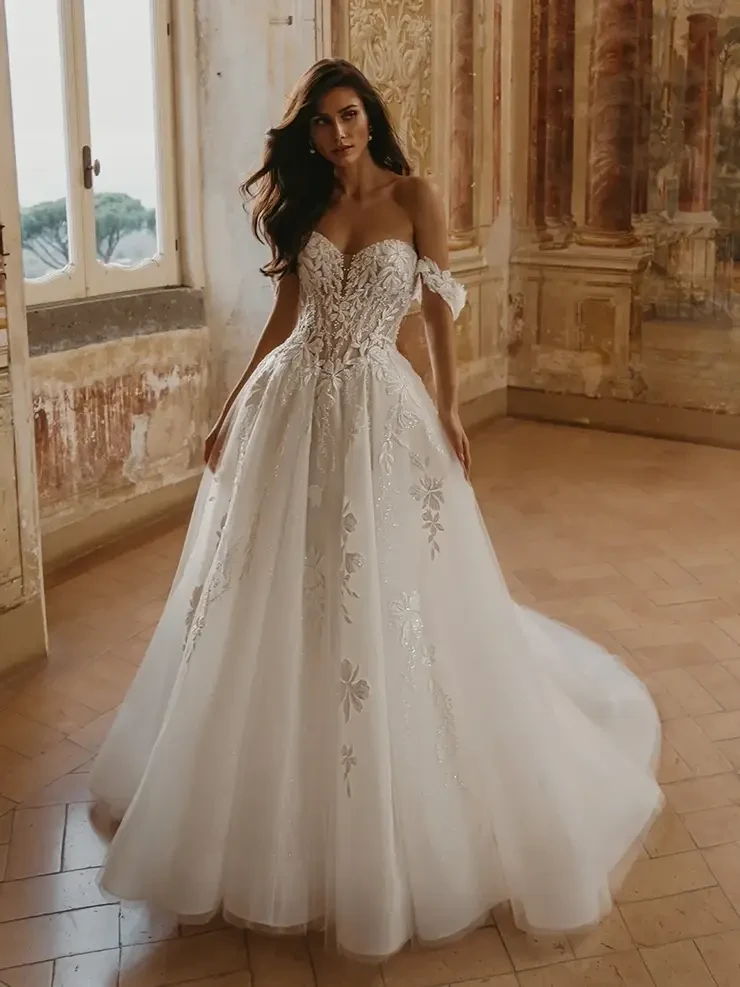 Model wearing a white wedding dress