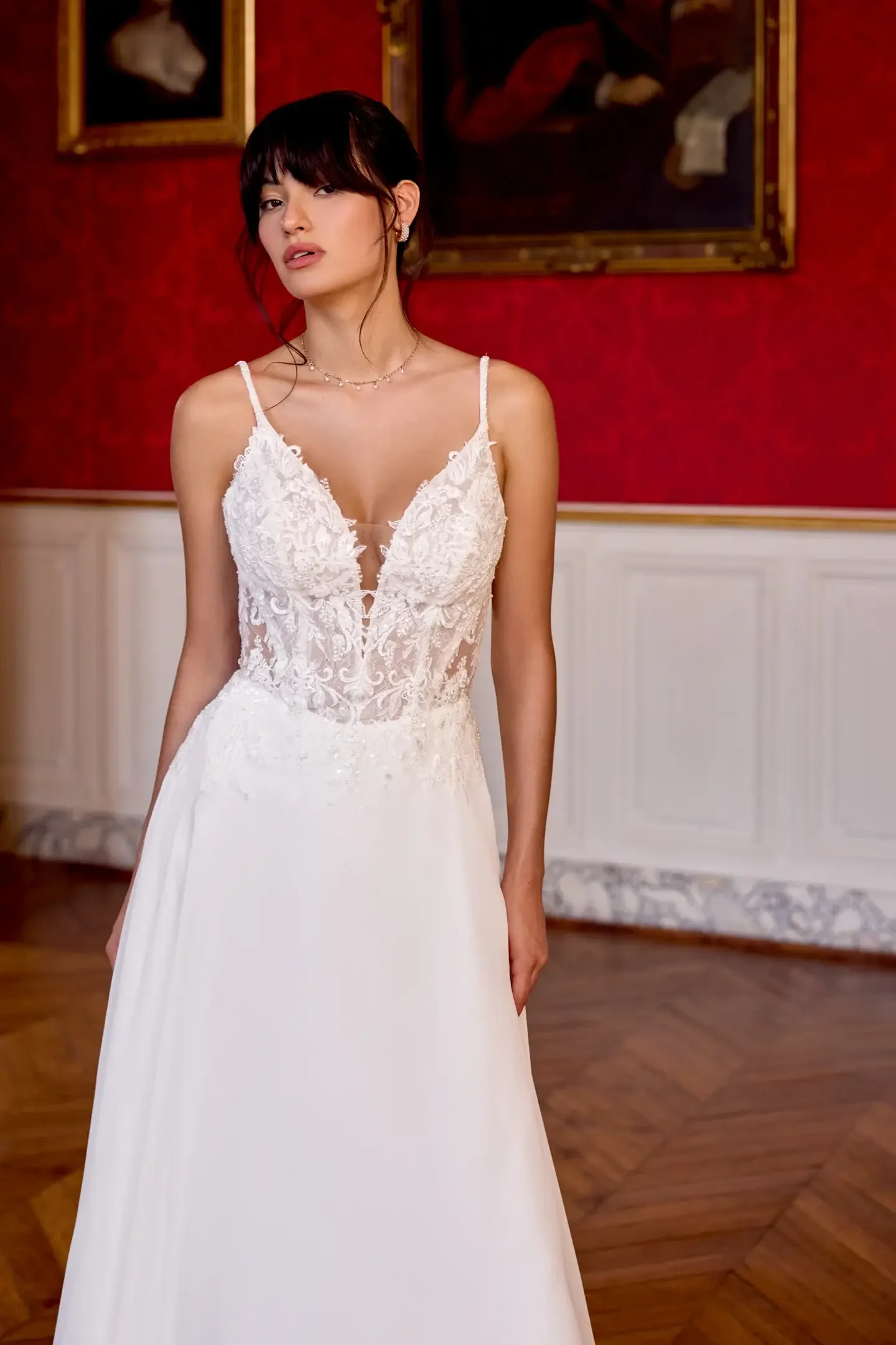 Model wearing a white wedding dress