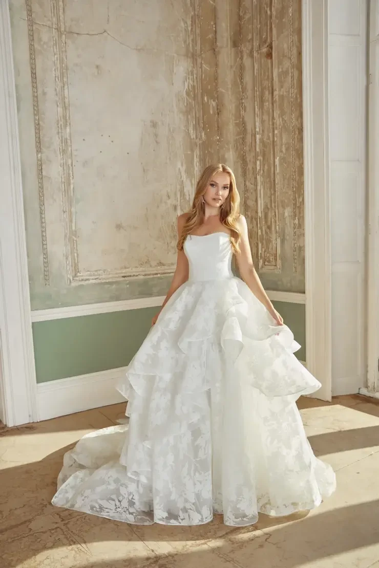 Model wearing a white wedding dress