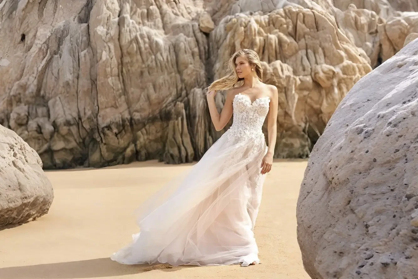 Model wearing a white wedding dress