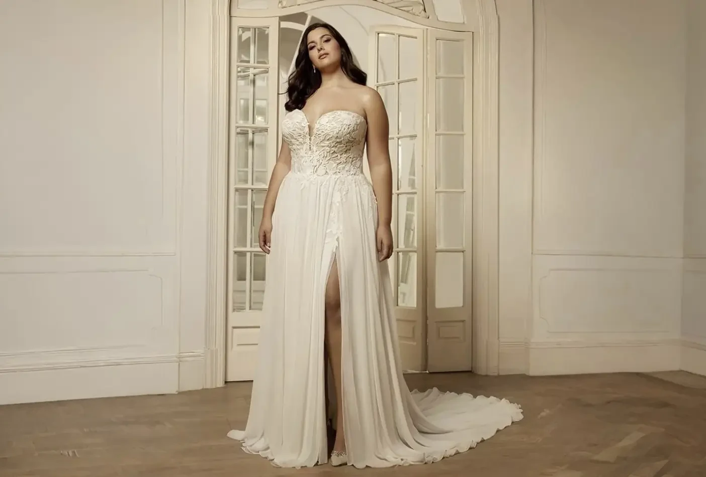 Model wearing a white wedding dress