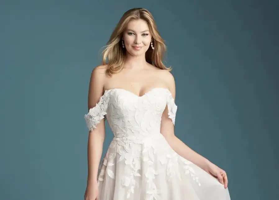 Model wearing a white wedding dress