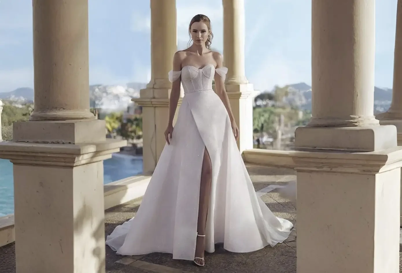 Model wearing a white wedding dress
