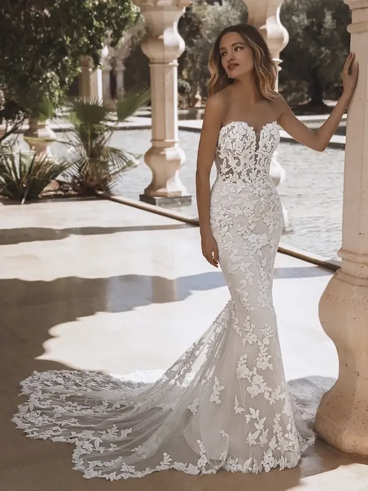 Model wearing a white wedding dress