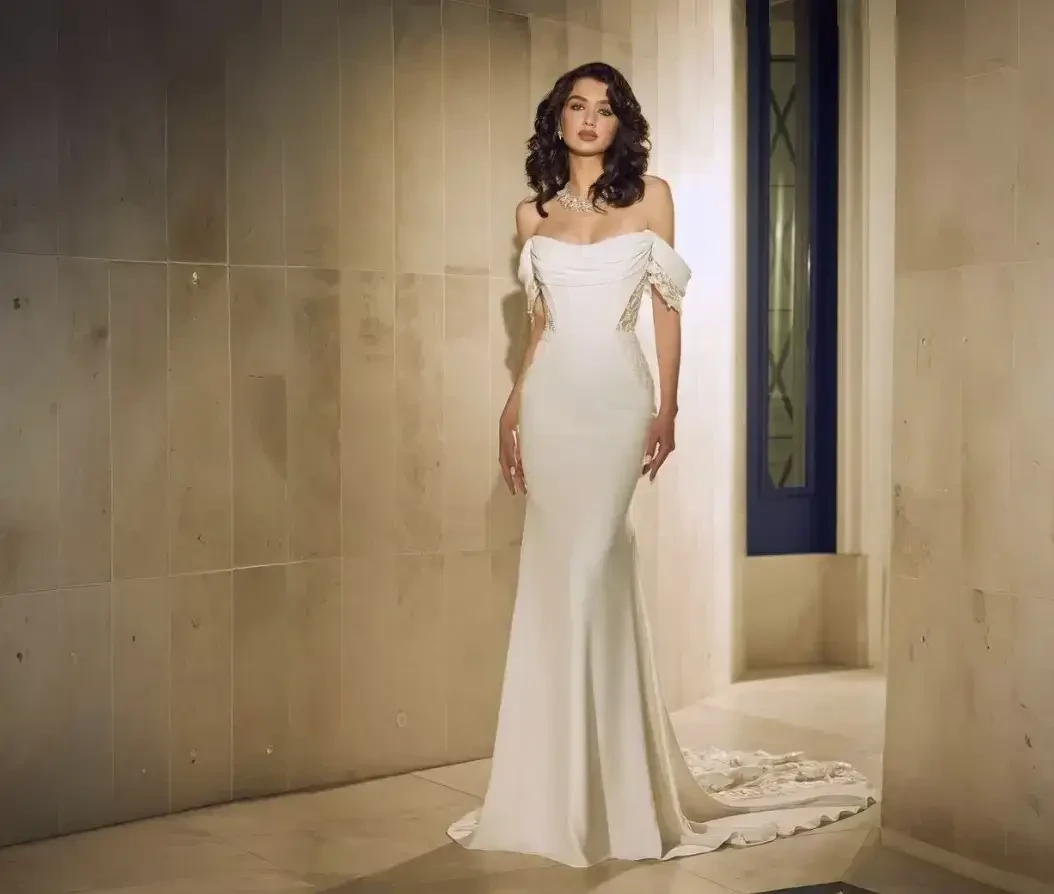 Model wearing a white wedding gown