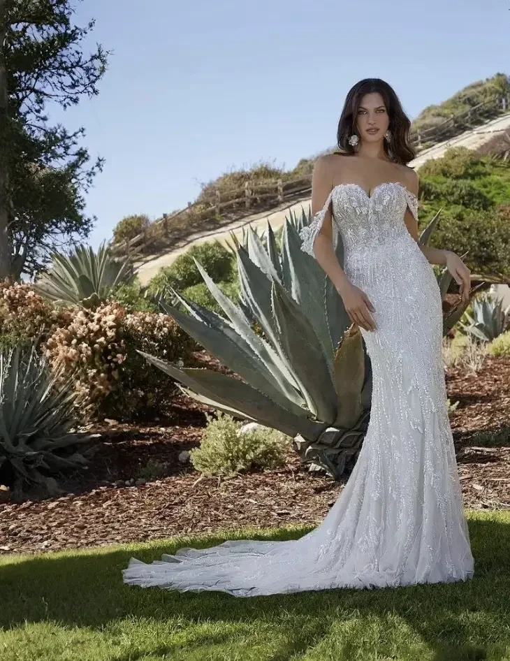 Model wearing a white wedding dress