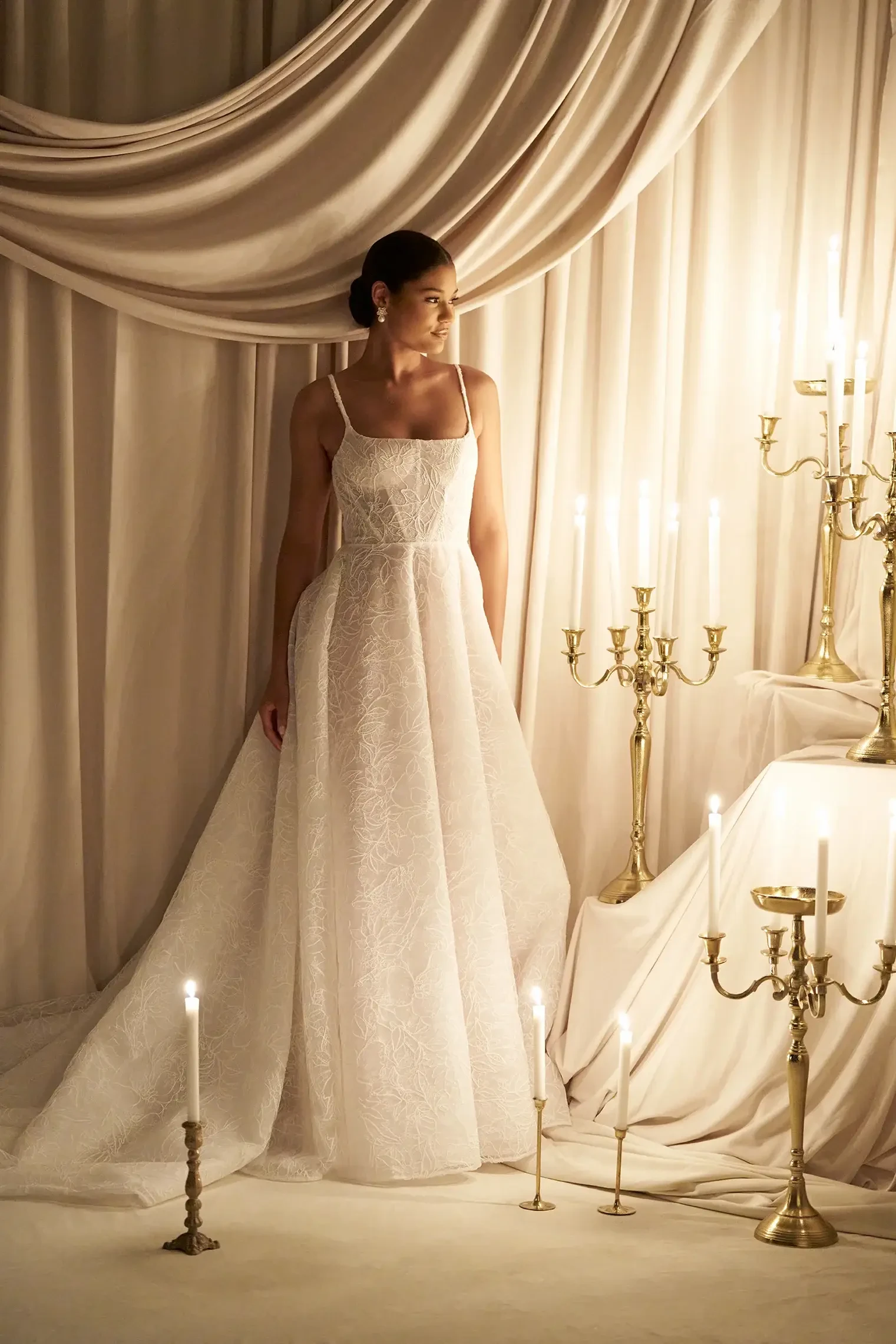 Model wearing a white wedding dress