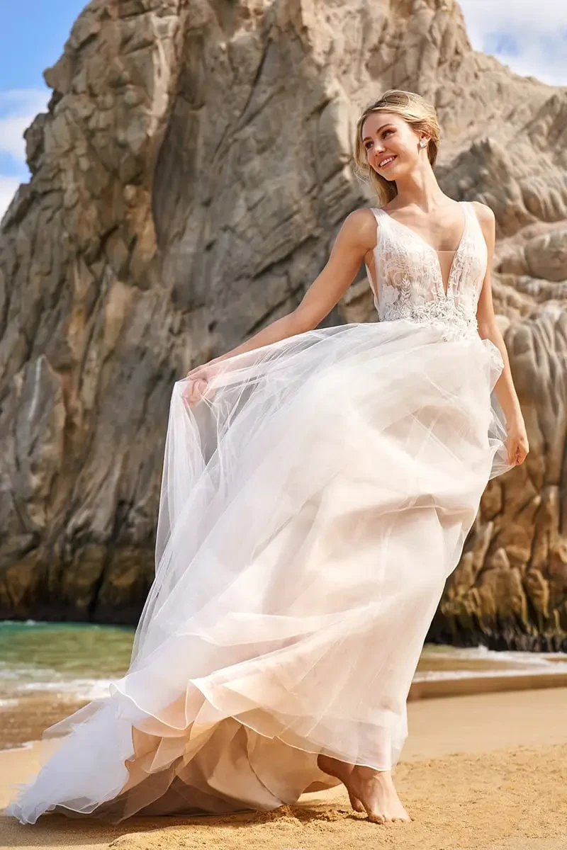 Model wearing a white wedding dress