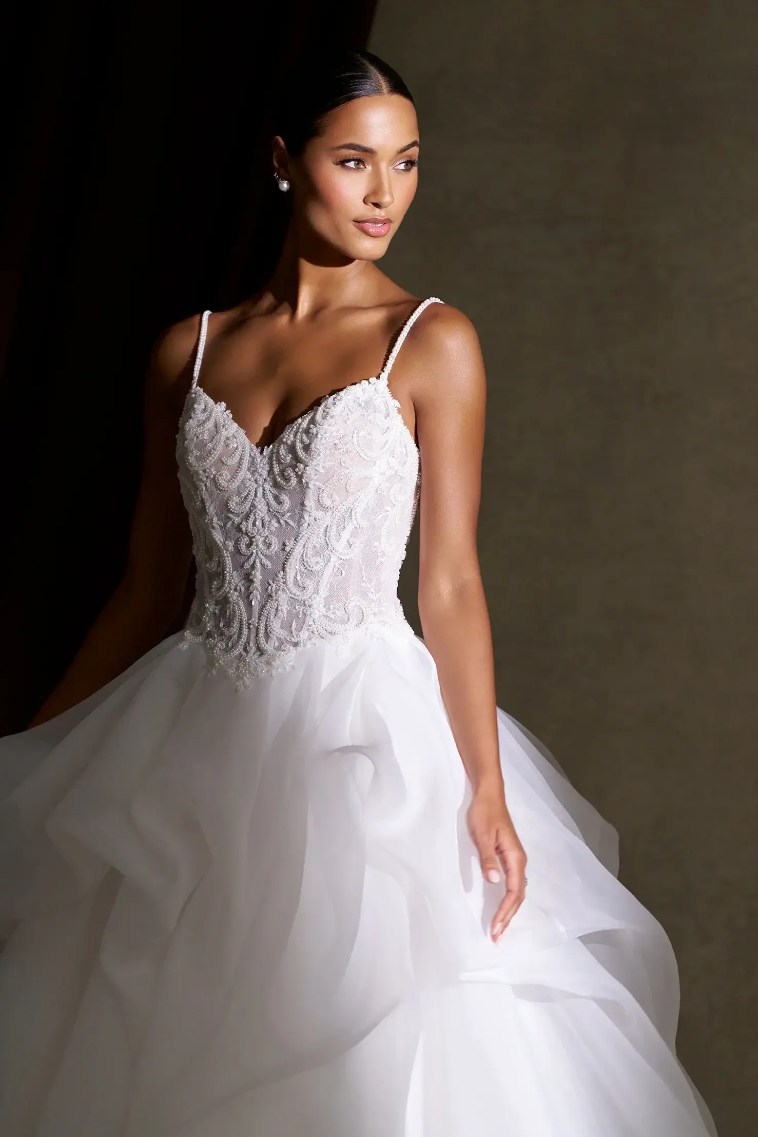 Model wearing a white wedding dress