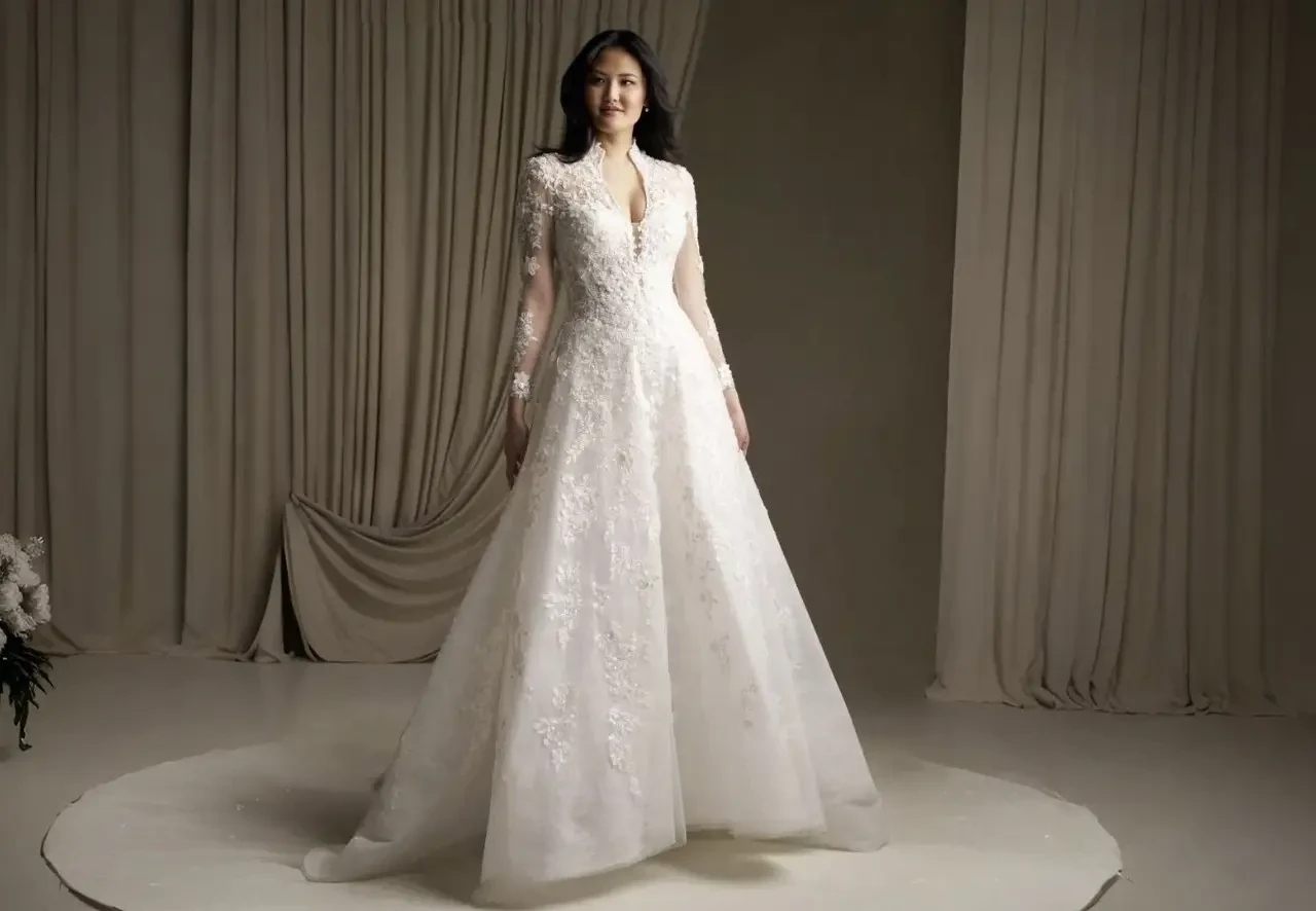 Model wearing a white wedding gown.