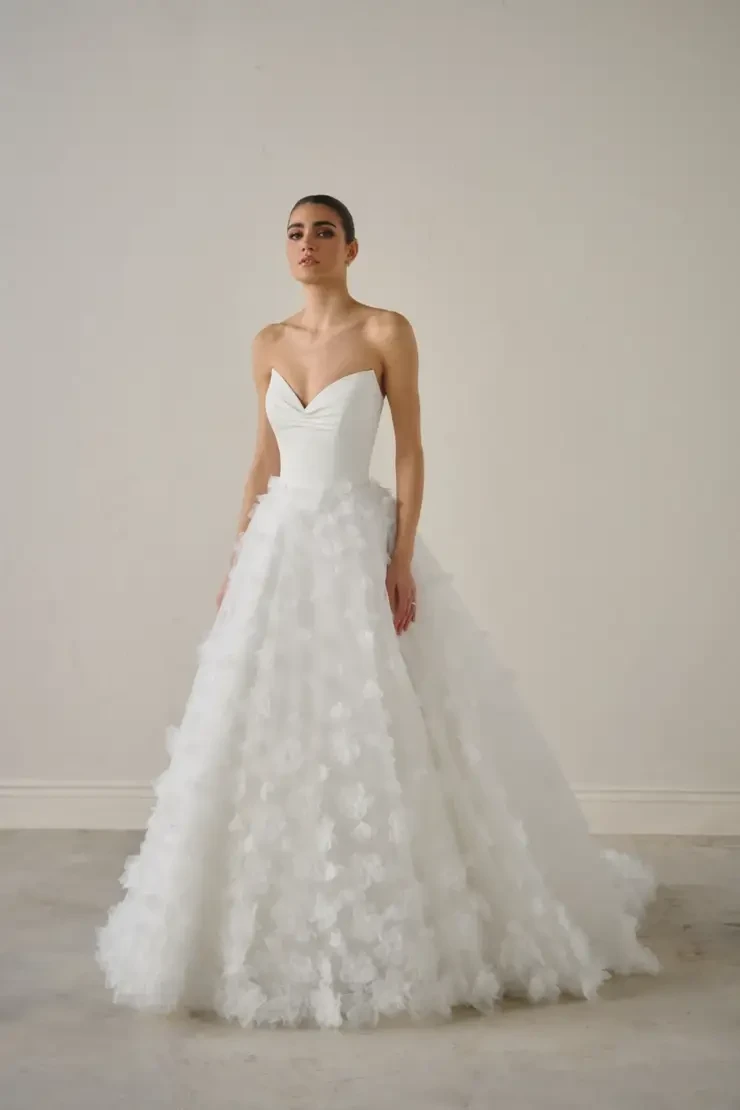 Model wearing a white wedding dress