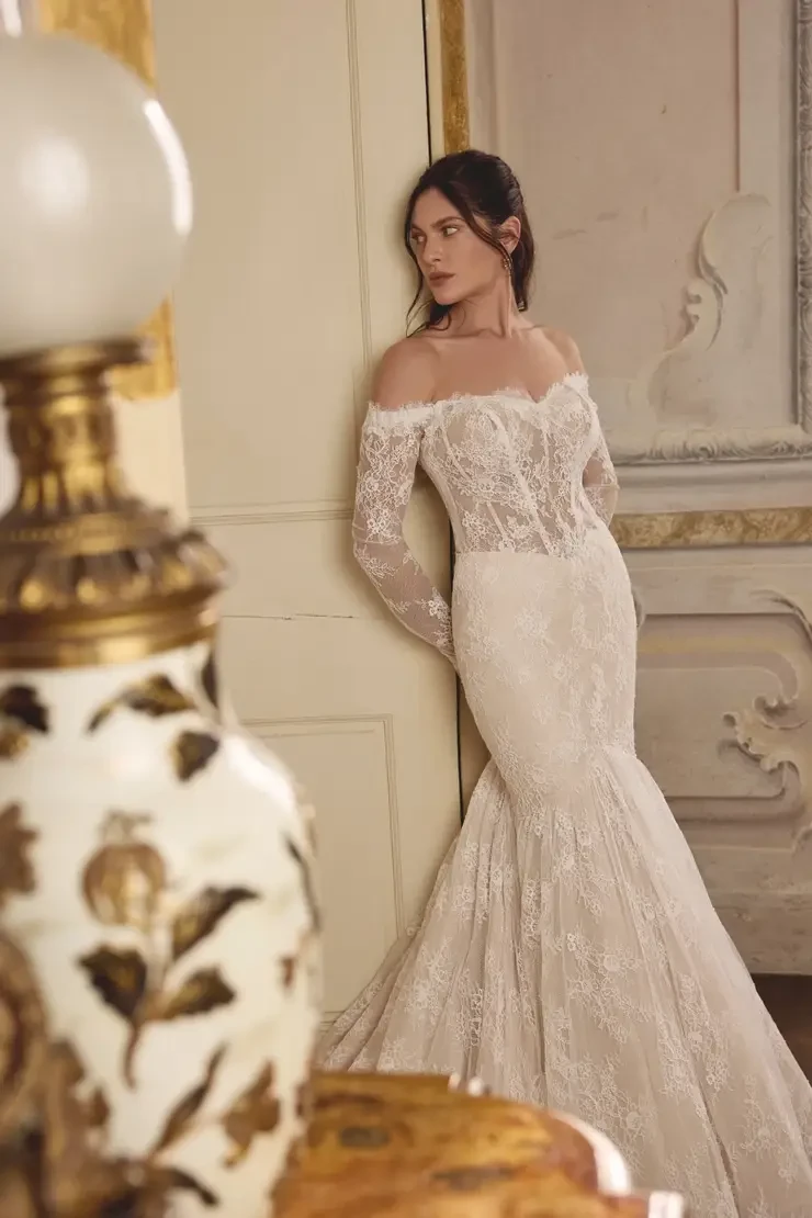 Model wearing a white wedding dress
