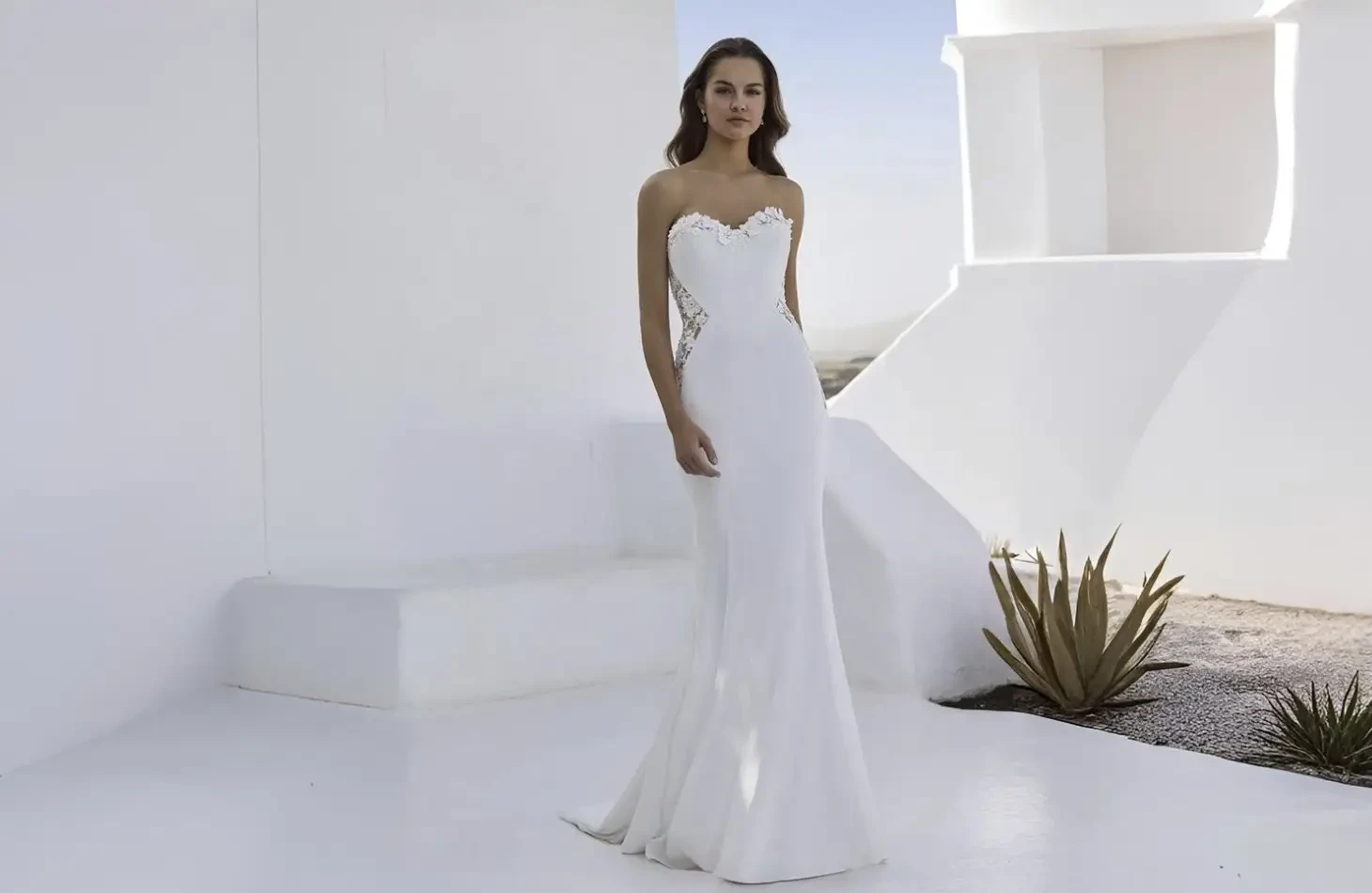 Model wearing a white wedding dress