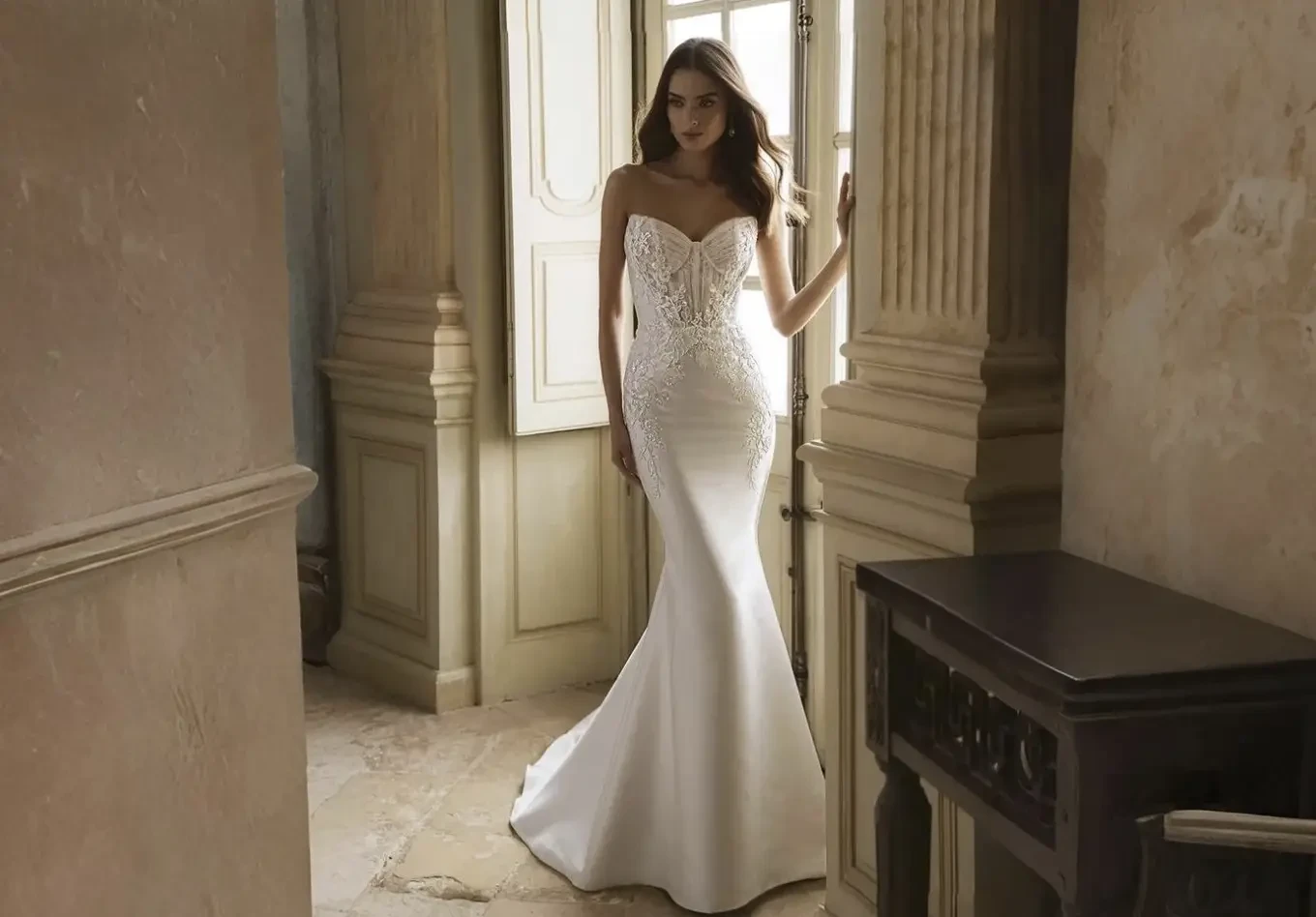 Model wearing a white wedding dress