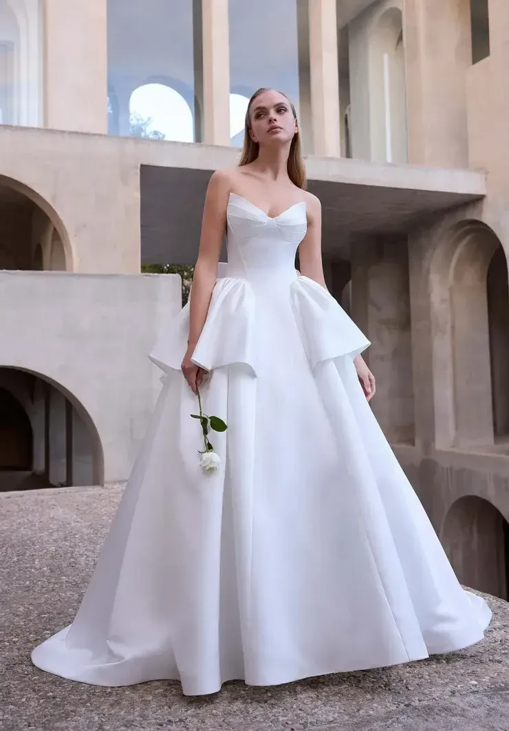 Model wearing a white wedding dress