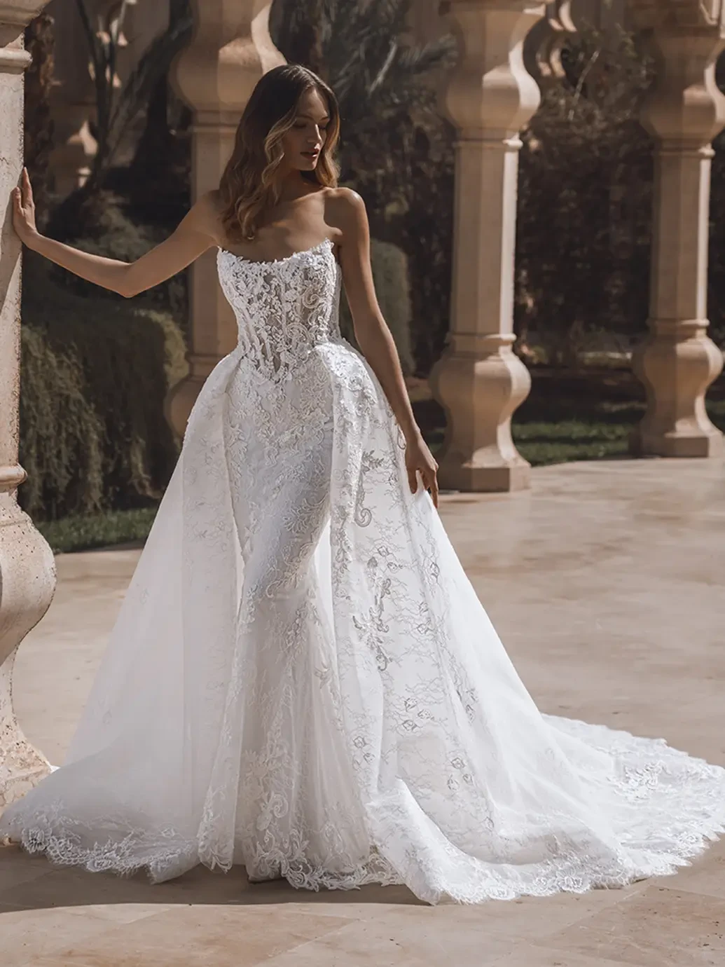 Model wearing a white wedding dress