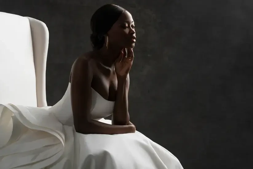 Model wearing a white wedding gown.