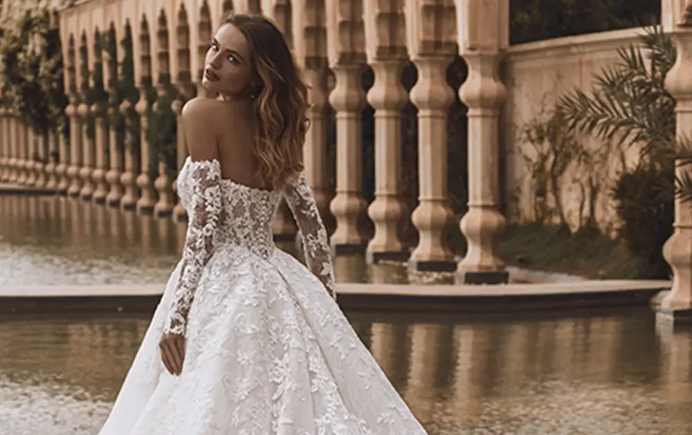 Model wearing a white wedding dress
