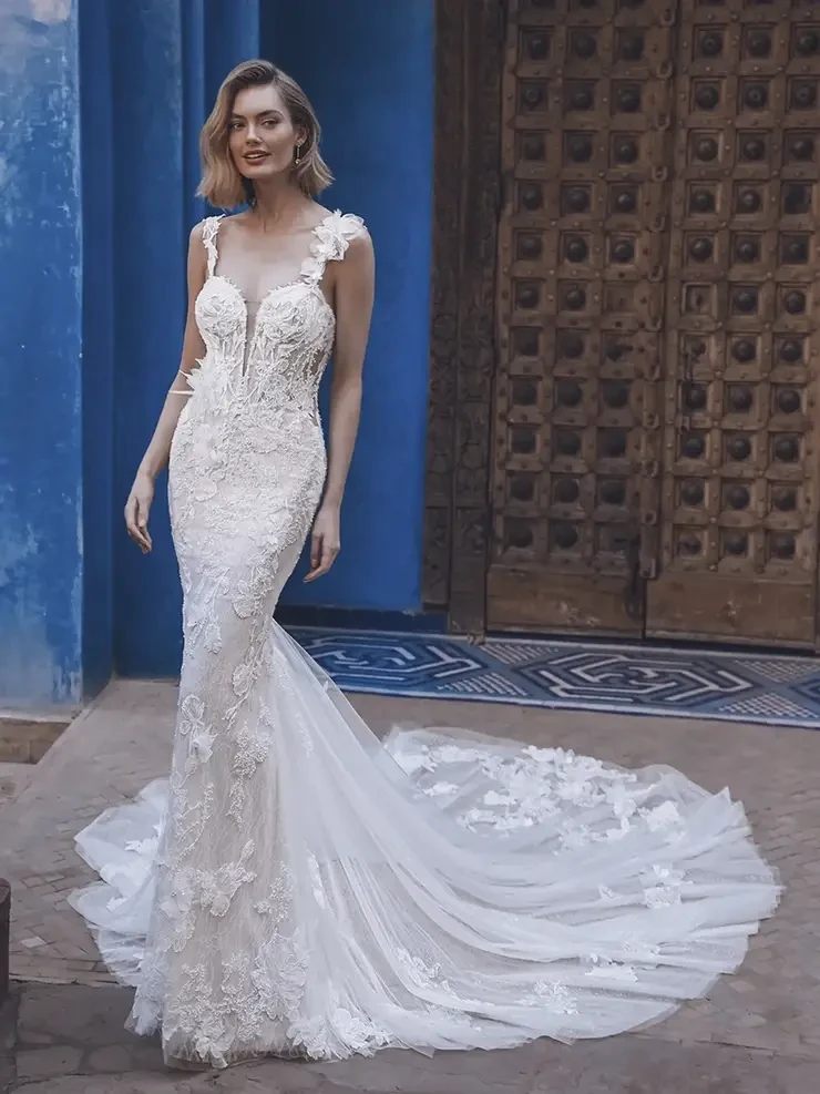 Model wearing a white wedding dress