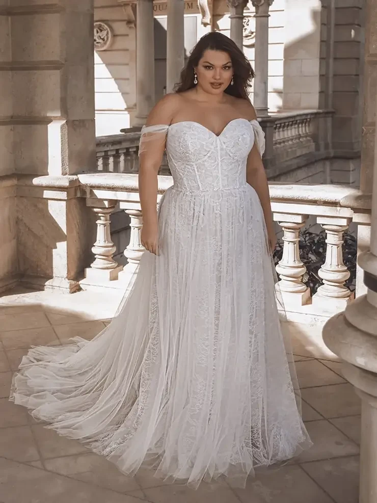 Model wearing a white wedding dress