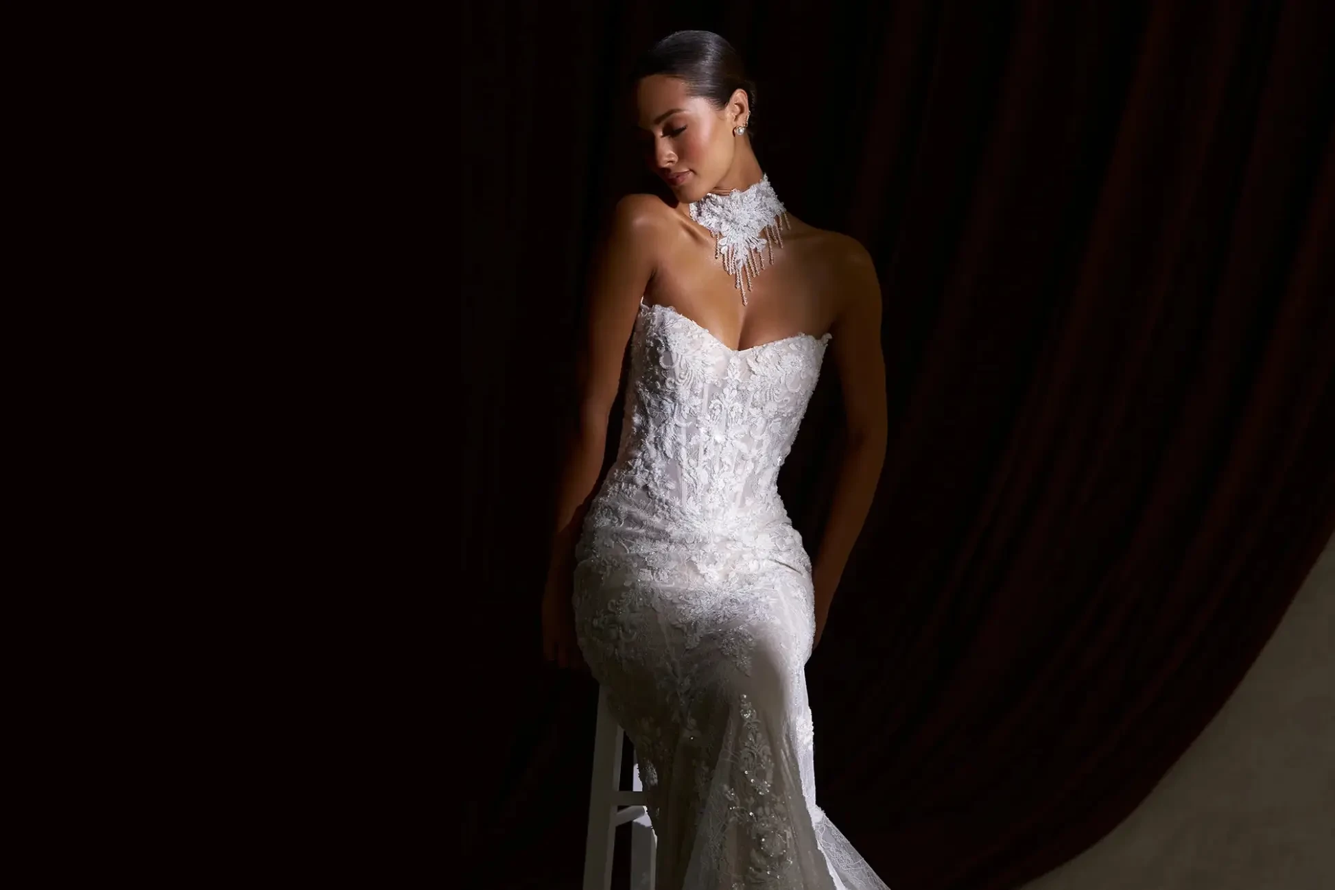 Model wearing a white wedding gown.
