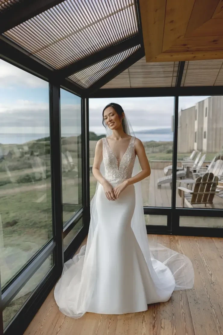Model wearing a white wedding dress