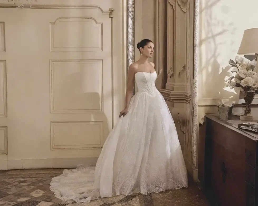 Model wearing a white wedding dress