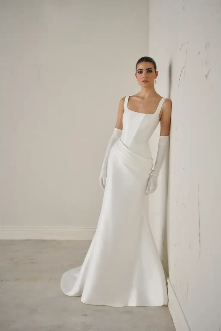 Model wearing a white wedding dress