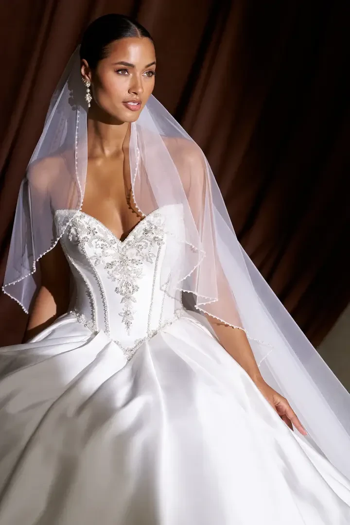Photo of the models wearing an wedding gowns