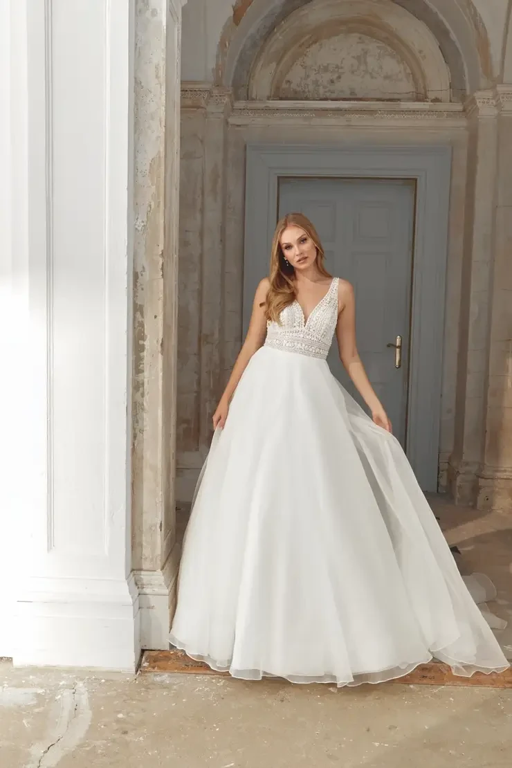 Model wearing a white wedding dress