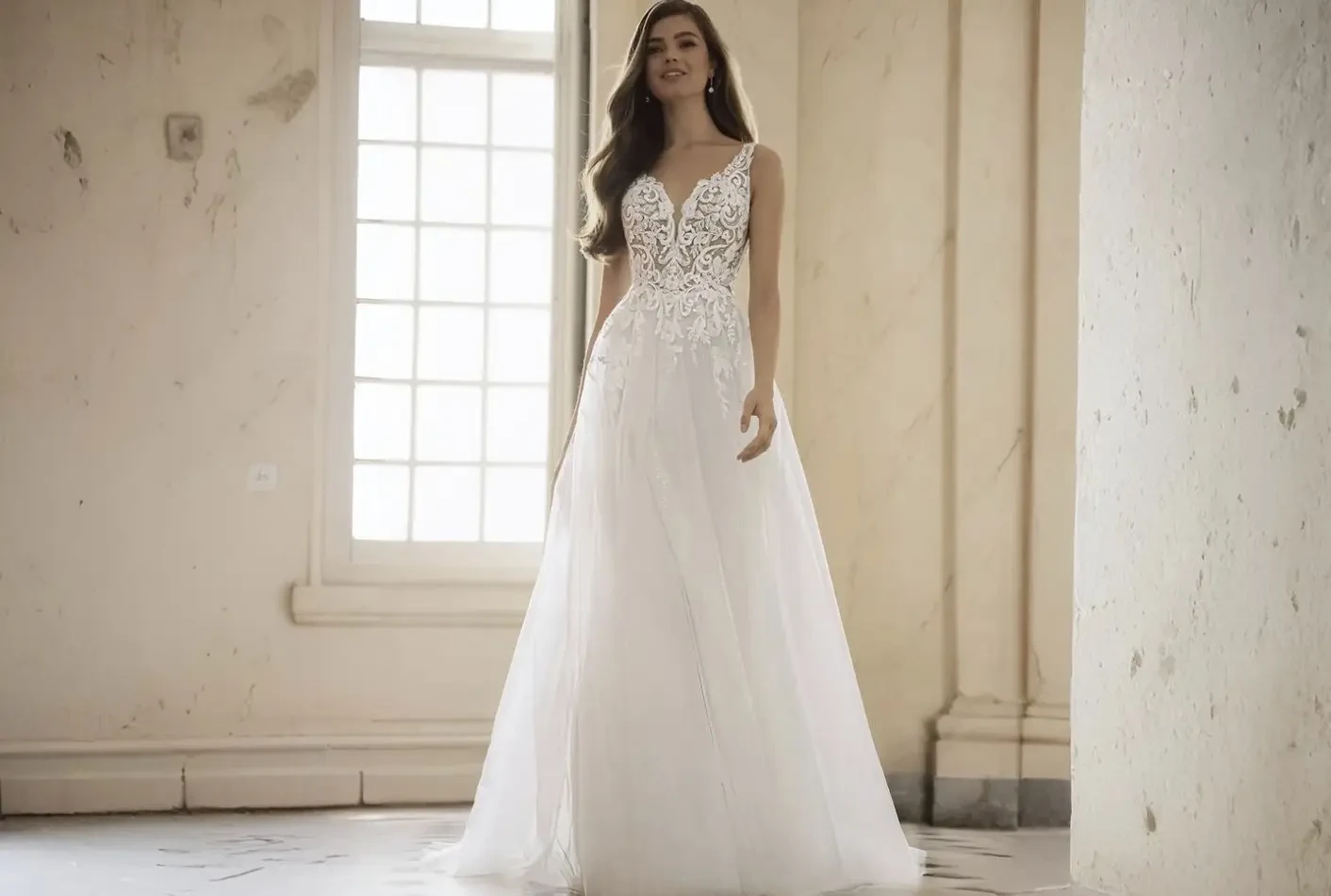 Model wearing a white wedding dress