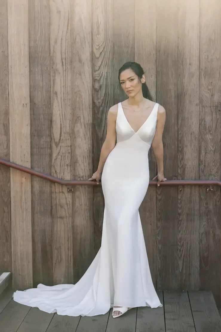 Model wearing a white wedding dress