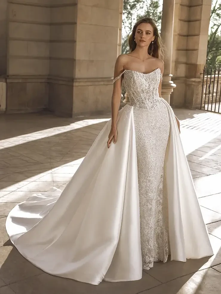 Model wearing a white wedding dress