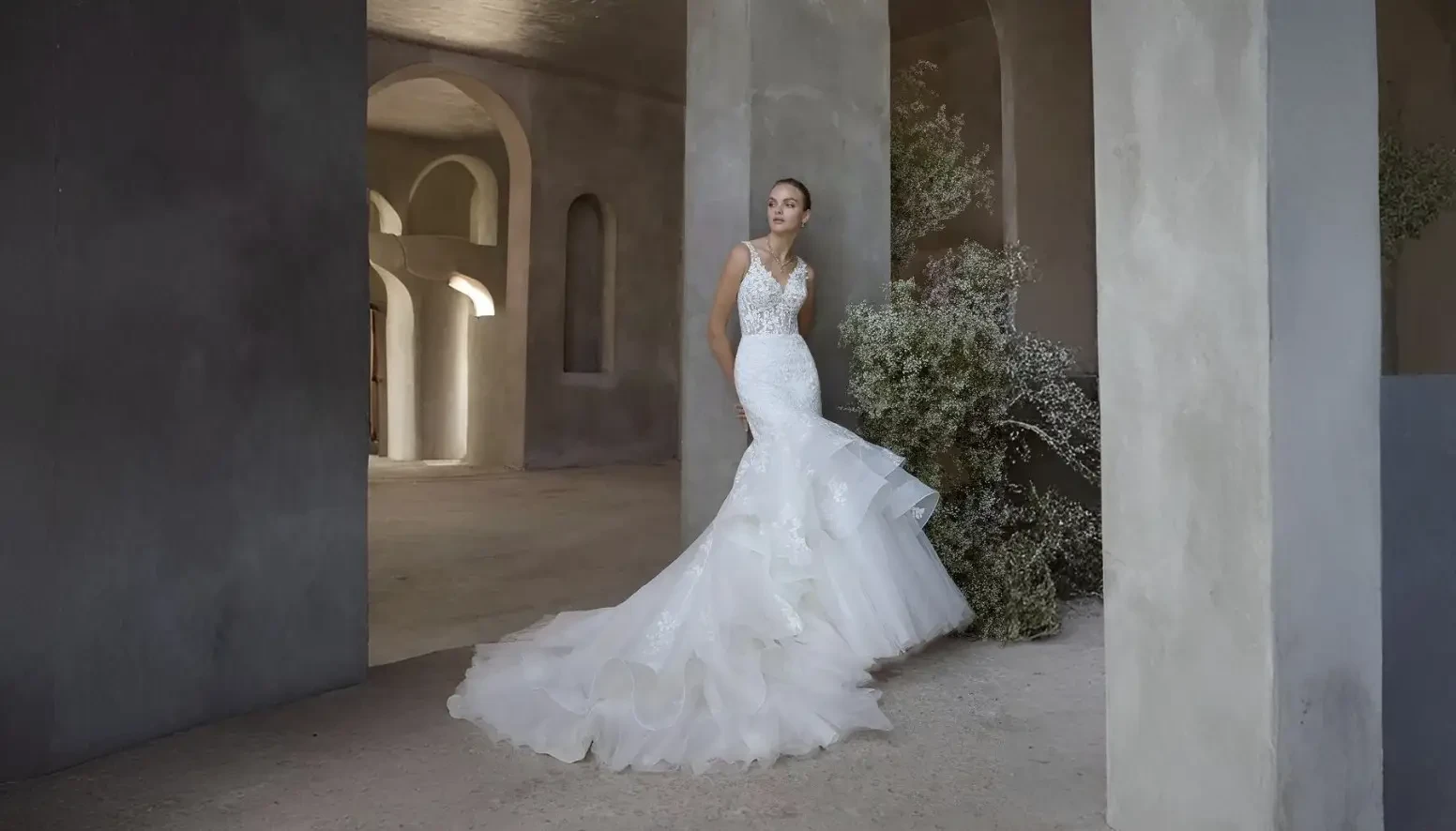 Model wearing a white wedding dress