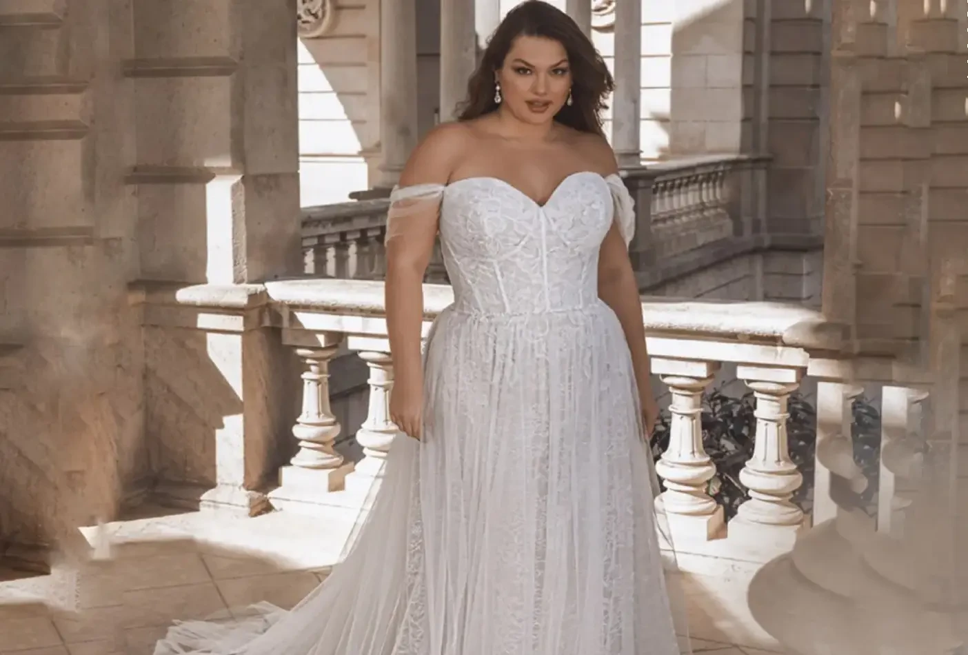 Model wearing a white wedding dress