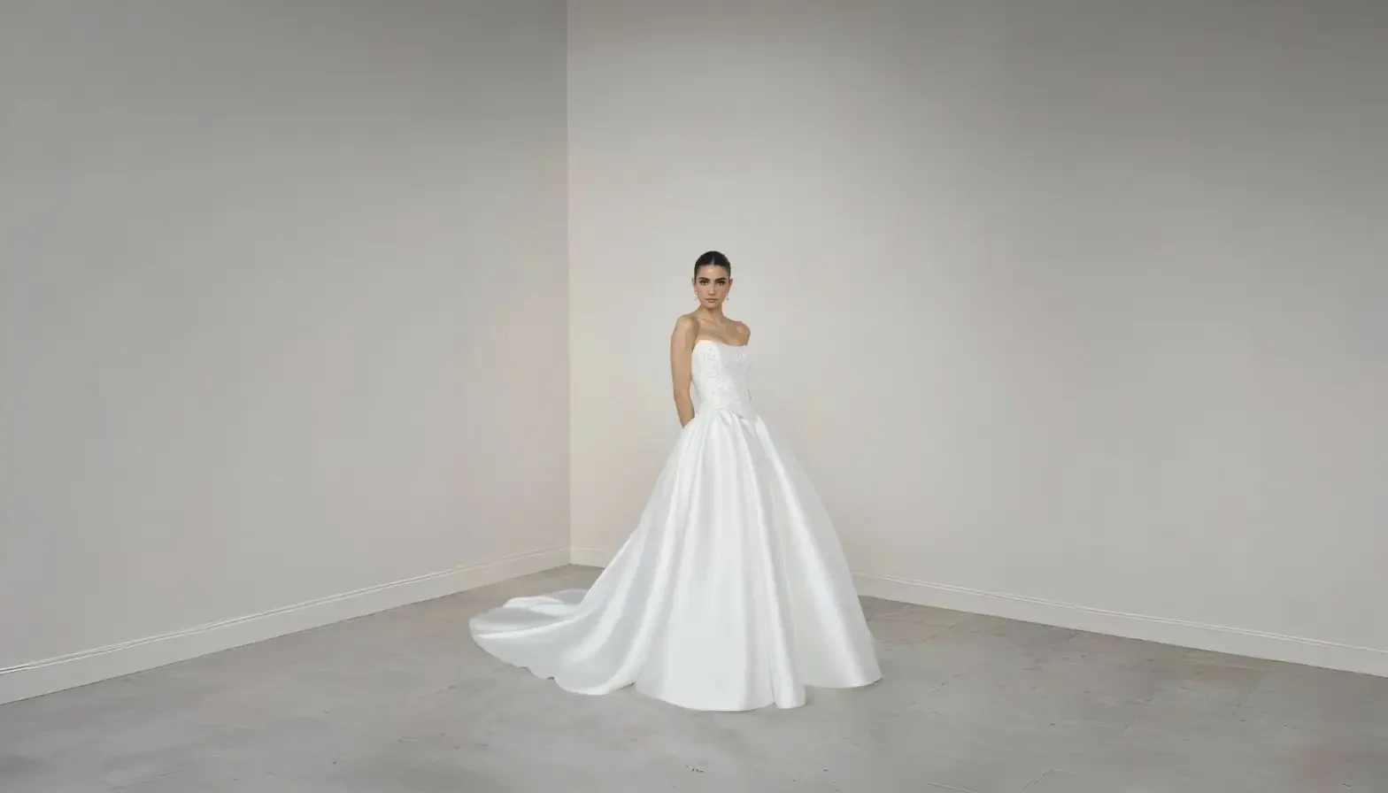 Model wearing a white wedding dress