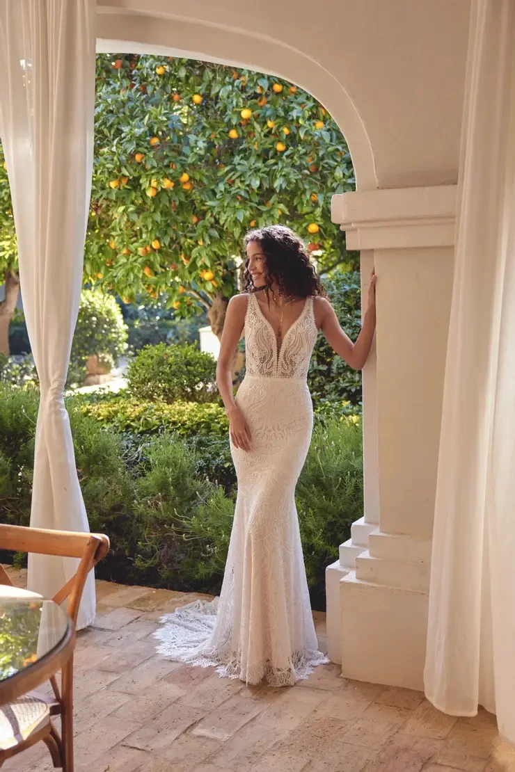 Model wearing a white wedding dress