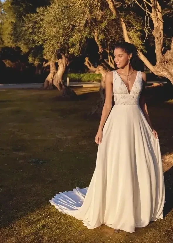 Model wearing a white wedding dress