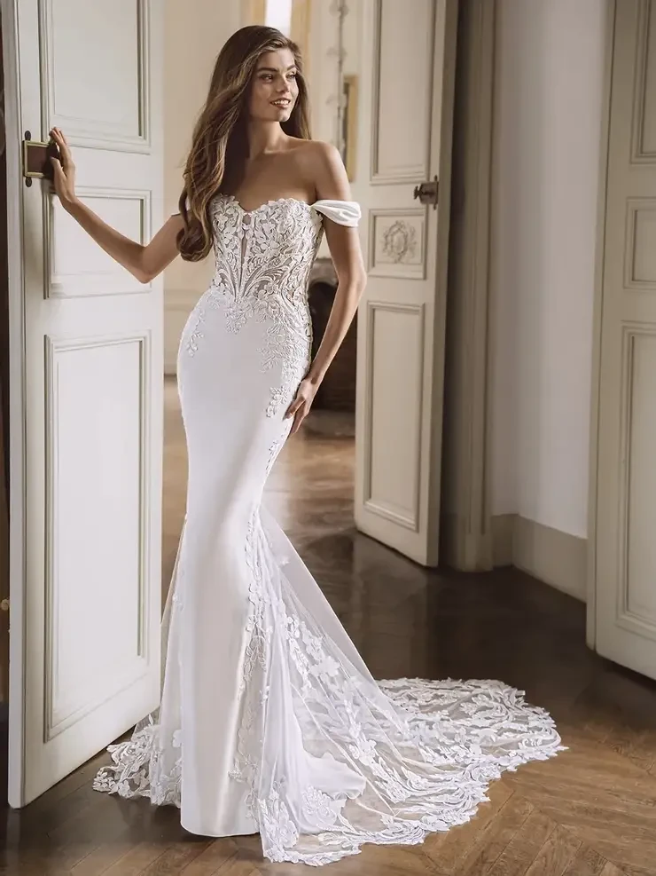 Model wearing a white wedding dress