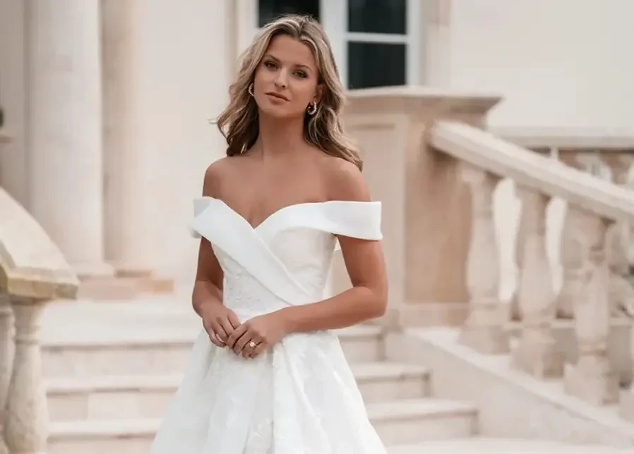Model wearing a white wedding dress