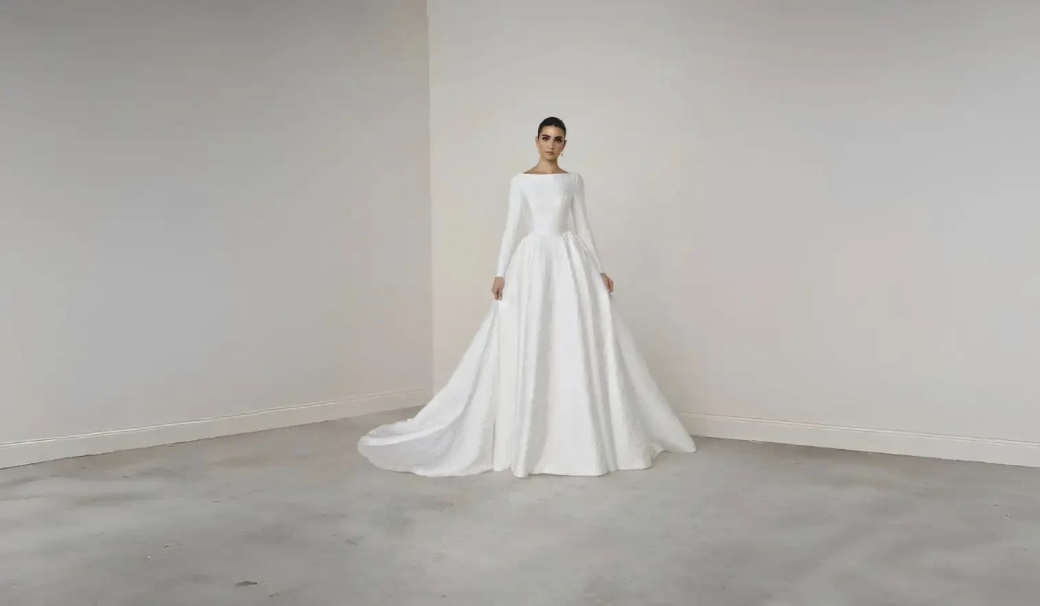 Model wearing a white wedding dress