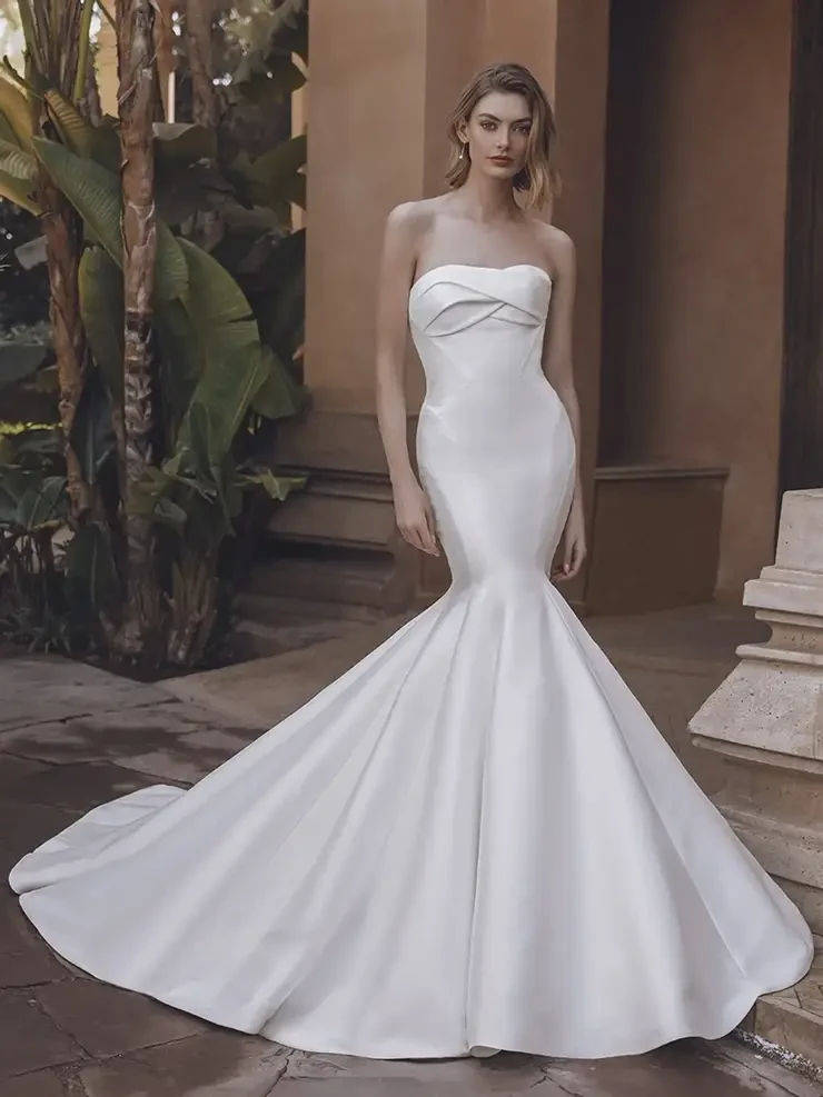 Model wearing a white wedding dress
