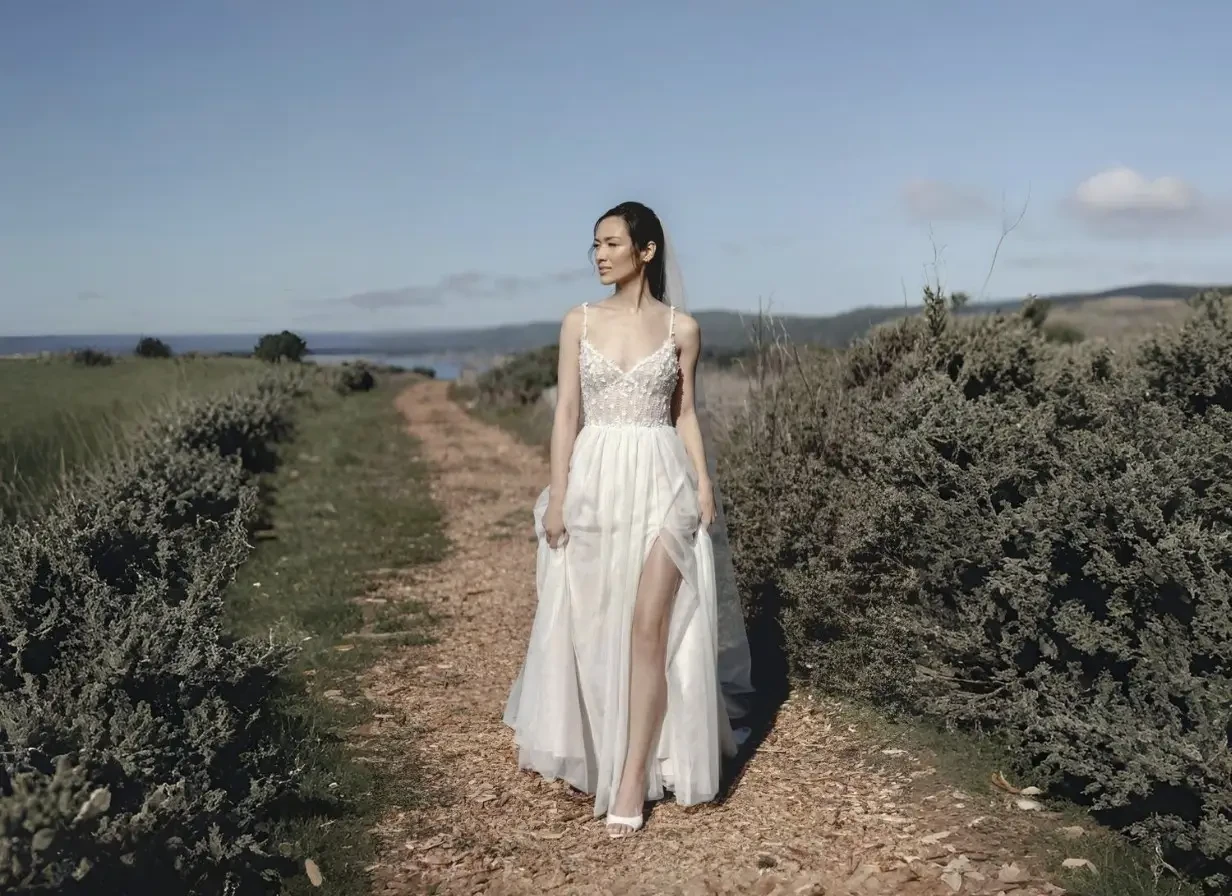 Model wearing a white wedding dress