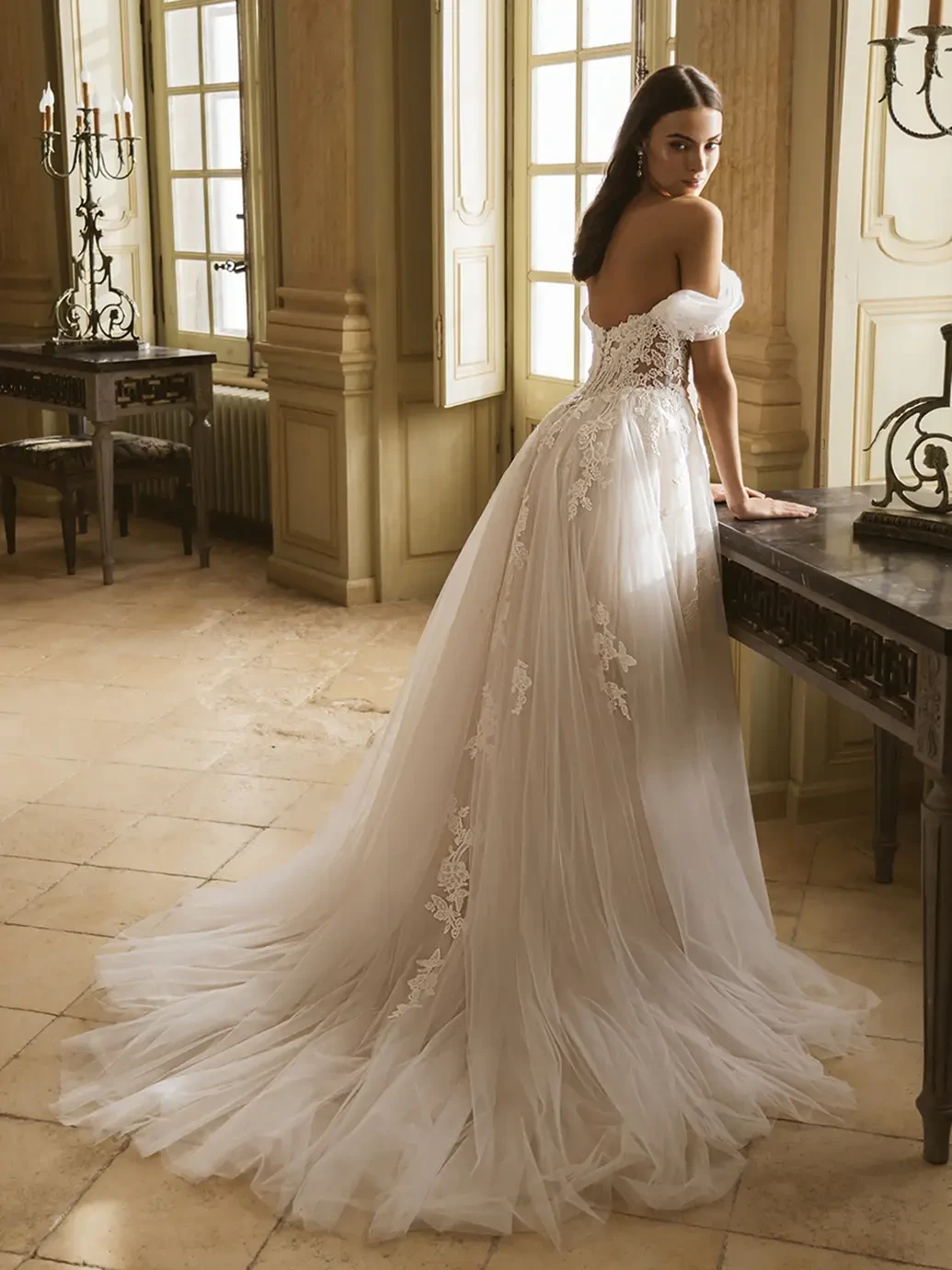 Model wearing a white wedding dress