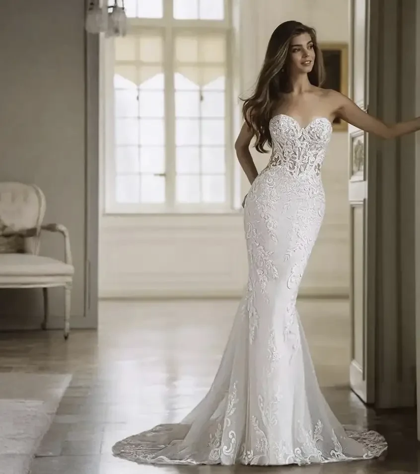 Model wearing a white wedding dress